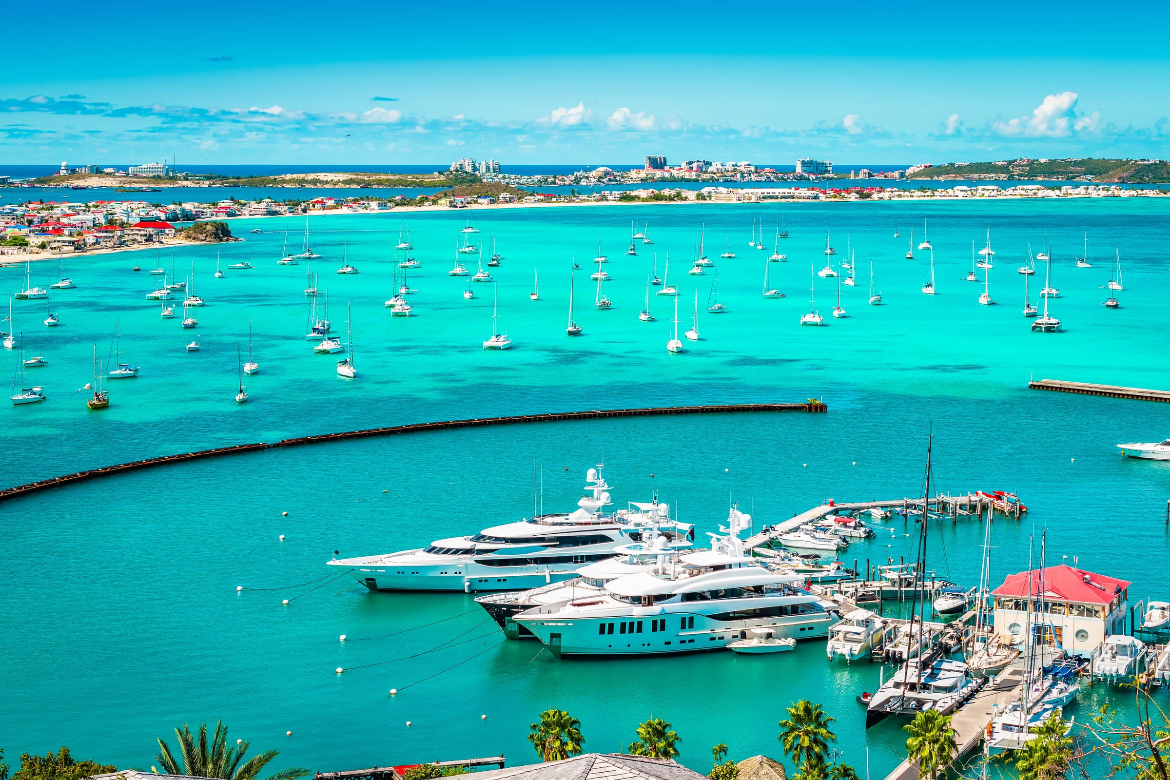 Yachts anchored in bright turquoise water
